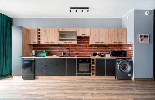 Lodz Apartment | Restored Nova Factory Residence by Rentujemy