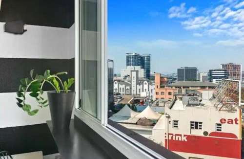 Fortitude Valley Apartment | Retro Chic Vibes, Tropical Pool & Prime Location