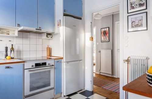 Skarpnack Apartment | Retro Retreat with Modern Comforts