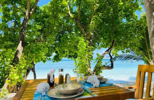 Thinadhoo Bed & Breakfast | RISING SUN BEACH VIEW