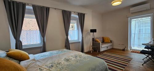 Ljubljana City Centre Apartment | Riva Residence in Old Town Ljubljana by the Cobblers' Bridge
