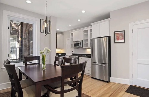 West Cambridge Condo | River Views Harvard Square 2BR with Cozy Fireplace