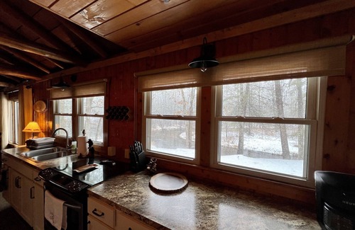 Baldwin Cabin | Riverfront cabin, on a secluded section of the Middle Branch, Pere Marquette