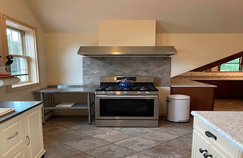 Manchester Center House | Rivers Edge 2-bedroom house in Manchester with WiFi, AC on second floor.