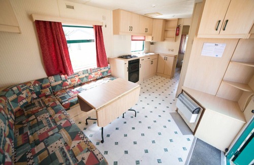 Saint-Laurent-des-Hommes House | Riverside 2 bedroom mobile home with patio