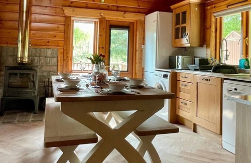 Aberchirder Cabin | Riverside Lodge—3-Bed Retreat in AberdeenshirenCozy, scenic, and peaceful.
