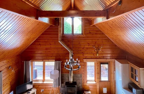 Aberchirder Cabin | Riverside Lodge—3-Bed Retreat in AberdeenshirenCozy, scenic, and peaceful.