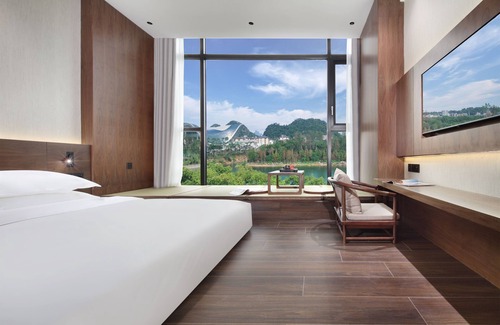 Xiufeng Hotel | Riverside Wing Hotel Guilin