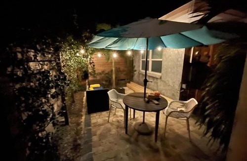 Cocoa Beach House | Romantic 1BR Cottage, 1 block from the Beach, 3 min Walk to Downtown