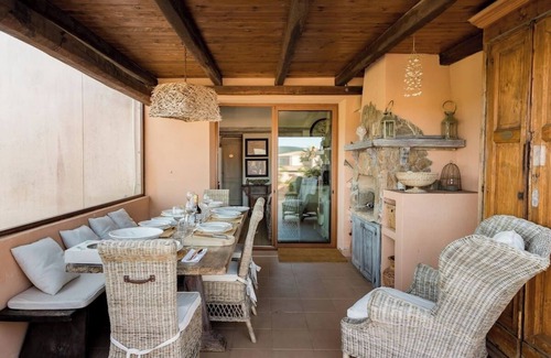 Porto Pozzo Apartment | Romantic apartment with sea view on the Maddalena archipelago.