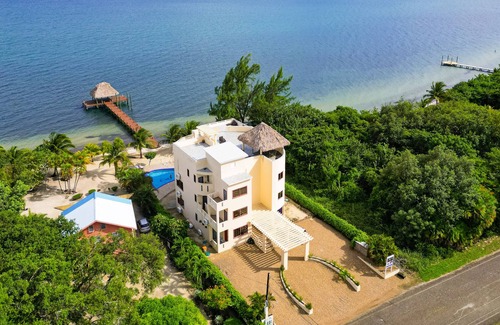 Surfside Condo | Romantic beachfront apartment w/ ocean views, shared pool, partial AC & WiFi!