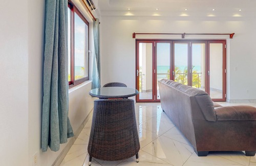 Surfside Condo | Romantic beachfront apartment w/ ocean views, shared pool, partial AC & WiFi!