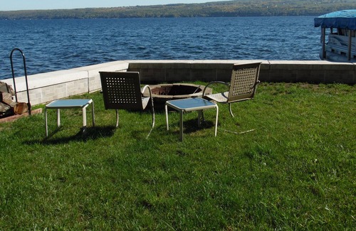 Valois Cottage | Romantic home on level Seneca Lake Front.