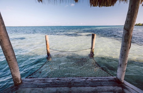 Thatch Caye Resort | Romantic Over-the-Water Bungalow w/Private Patio & Amazing Views - A/C Included