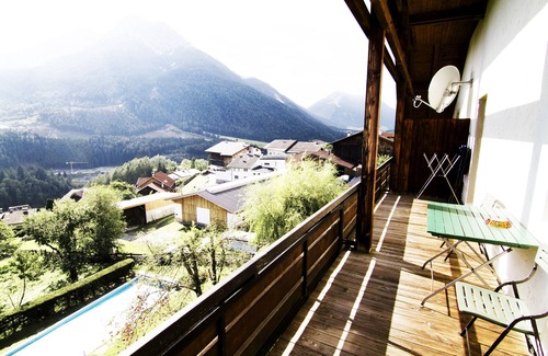 Telfes im Stubai Apartment | Romantic studio with garden, SWIMMING POOL, mountain railways for free