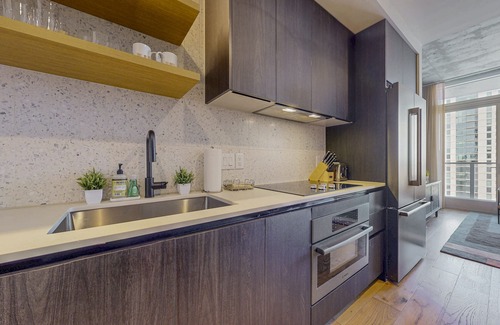 Rainey Street Historic District Apartment | Rooftop pool, 31st floor balcony, cocktail bar and coffee shop