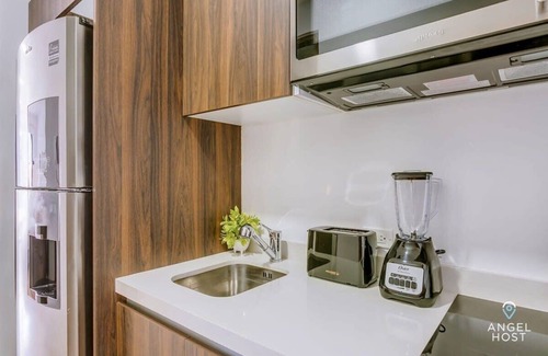 Centro Apartment | Rooftop Pool Retreat | Fiber WiFi | Steps to Beach