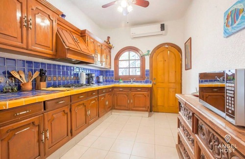 Lomas de Palmira Apartment | Rooftop Views & Sunsets, Steps to the Malecón