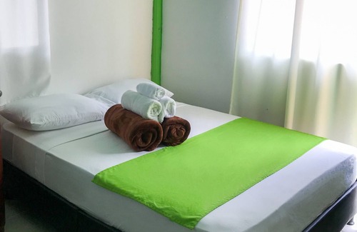 Pereira House | Room with 1 double bed and 2 single beds