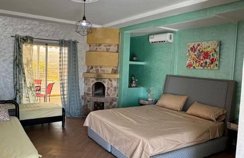 Ouzoud Bed & Breakfast | Room with veranda terrace.