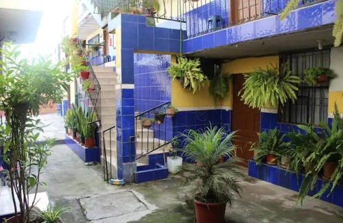 Pasochoa Apartment | Rooms within what was a schooln