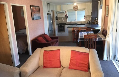 Okere Falls House | Rotoiti Lakeside Cottage,s Primo Lake Front,Flat section, Drive to the house,