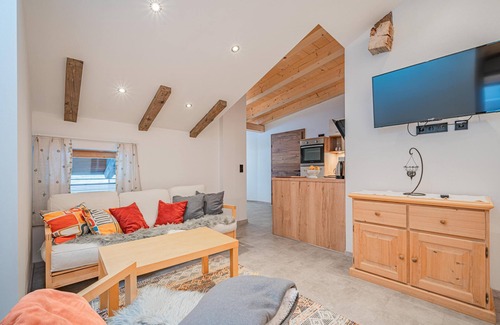 Hopfgarten Markt Apartment | Rustic farmhouse-holiday apartment combination