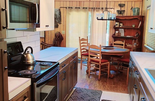 Bass Lake House | Rustic Lakeview Lodge at Bass Lake. Bookable boat slip!