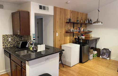 South Lamar Condo | Rustic Pool Front Condo with AC, High Speed Wifi in Beautiful Austin, TX