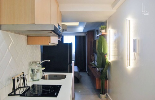 San Fernando Condo | Rustic-Themed Studio with Mt. Arayat View, Instax, Netflix, Karaoke & Boardgames