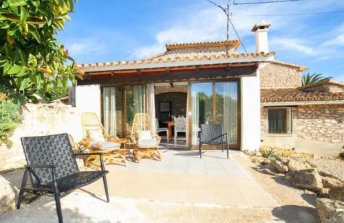 Fustera House | Rustico Appartment 'Olta' in finca, see-and garden side