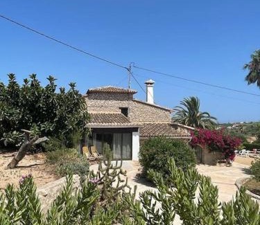 Fustera House | Rustico Appartment 'Olta' in finca, see-and garden side