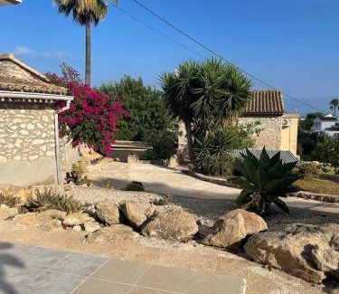 Fustera House | Rustico Appartment 'Olta' in finca, see-and garden side