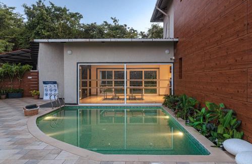 Paud Villa | SaffronStays Kaleidoscope, 4BR heated pool villa in Mulshi