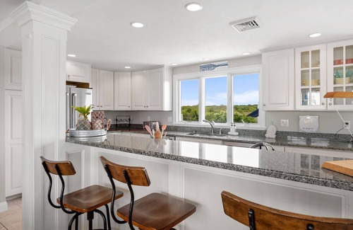 Sagamore Beach House | Sagamore Beach just across the street from this gorgeous home with private heated pool