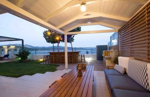 Lygia Villa | SALTY BREEZE Beachfront Villa