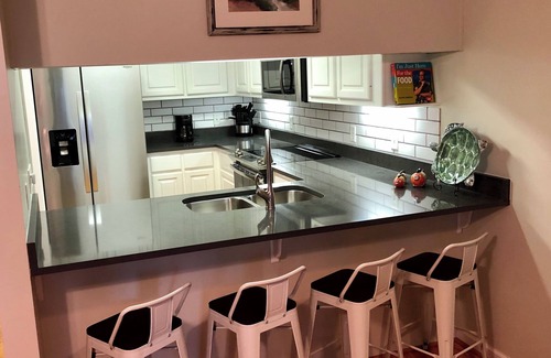 Saint Simons Island Condo | Salty Breeze Condo on St. Simons with Elevator and pool near Beach and Village