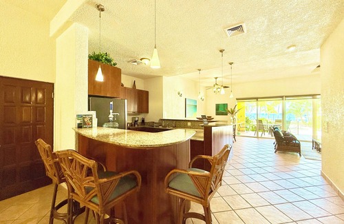 French Harbour House | Sand View Condo #5 @ Coral Sands , West Bay Beach