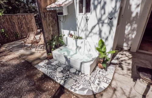 Morong Apartment | SAYA Nest Self-Service Home in Rainforest Nest with Kitchen - Monkeys, Bats, Pet Friendly with a Fee