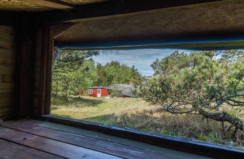 Rindby Strand House | Scenic Log Cabin in Rindby-By Traum