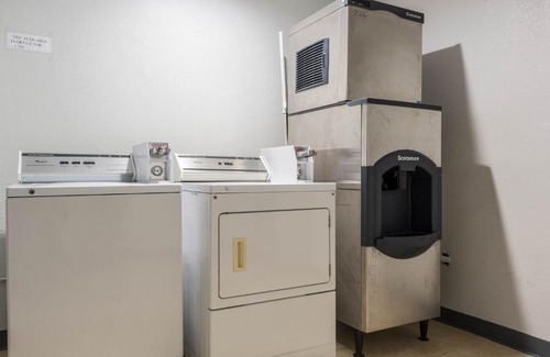 Tomball Hotel | Scottish Inn and Suites Tomball