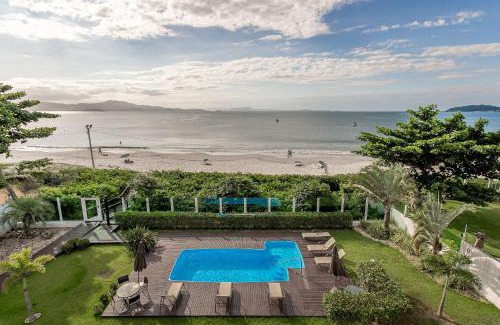 Cachoeira do Bom Jesus Apartment | SEA FRONT | Balcony with Barbecue grill #CHA06