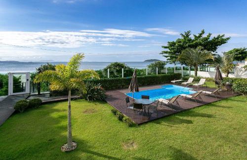 Cachoeira do Bom Jesus Apartment | SEA FRONT | Balcony with Barbecue grill #CHA06