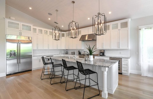 Anna Maria House | Sea La Vie Beach House - Luxury Home w/Pool, Spa, Dock & Canal Access on Anna Maria