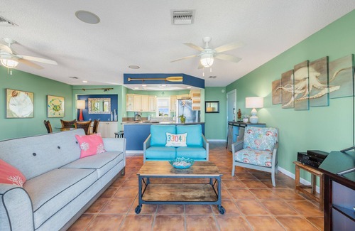 New Town Condo | SEA-NIC VIEW ~ 2 BR/2Ba Water-front views, Heated Pool Access and Dockage!
