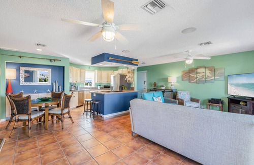 New Town Condo | SEA-NIC VIEW ~ 2 BR/2Ba Water-front views, Heated Pool Access and Dockage!