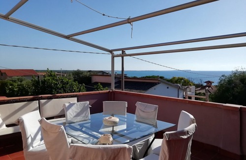 Torre del Pozzo Apartment | Sea view terrace and garden relaxation in green spaces