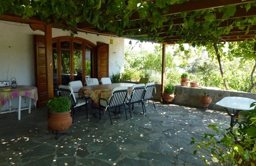 Chalcis Cottage | Seafront cottage with orchard and garden