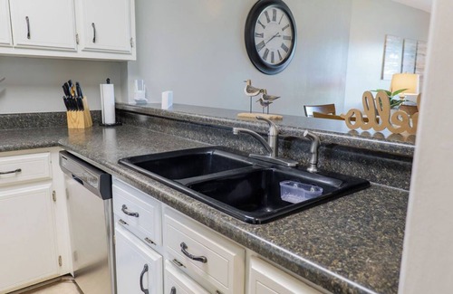 Lake Park Condo | Seas The Day with this cozy 2-bedroom lakefront condo.