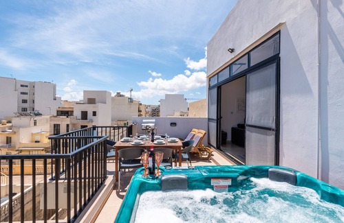 Bugibba Apartment | Seashells Penthouse Hot Tub Seaview by Getaways Malta